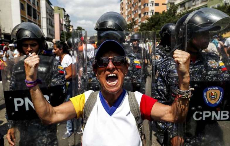 Manifestantes de oposição protestam contra o governo de Nicolás Maduro em Caracas, na Venezuela – 09/03/2019 